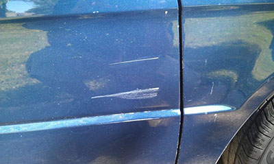 This is a car door that has been clened with Buff pro. it is shiny and clean.